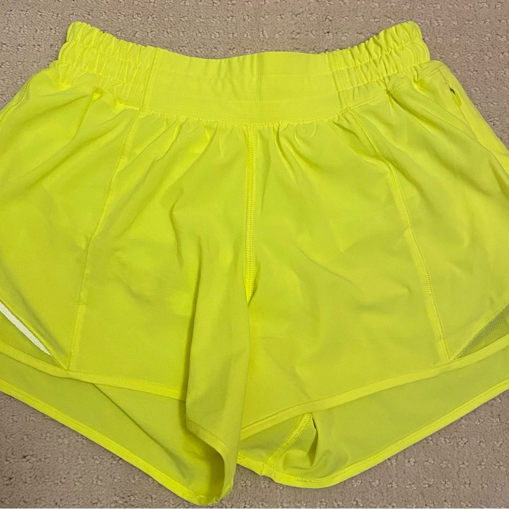 Size 4 highlight yellow Lululemon 4” low rise Hotty hots! Perfect condition!